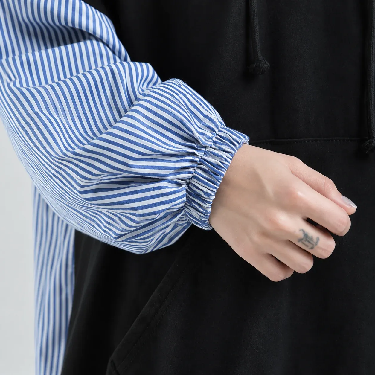 Nell Striped Hooded Tunic, source-supported construction detail