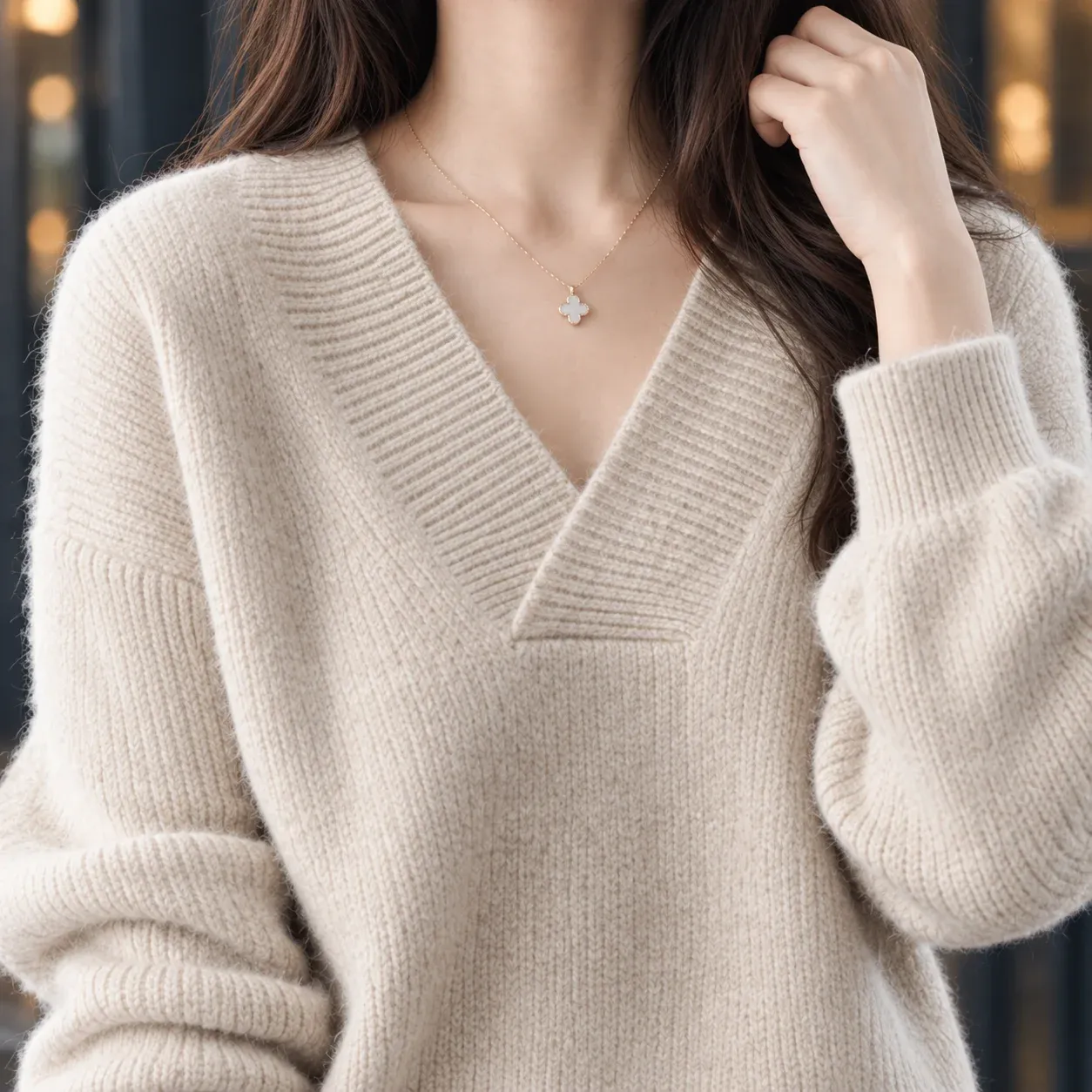 Joelle Wide-V Sweater — Creamy-white construction detail