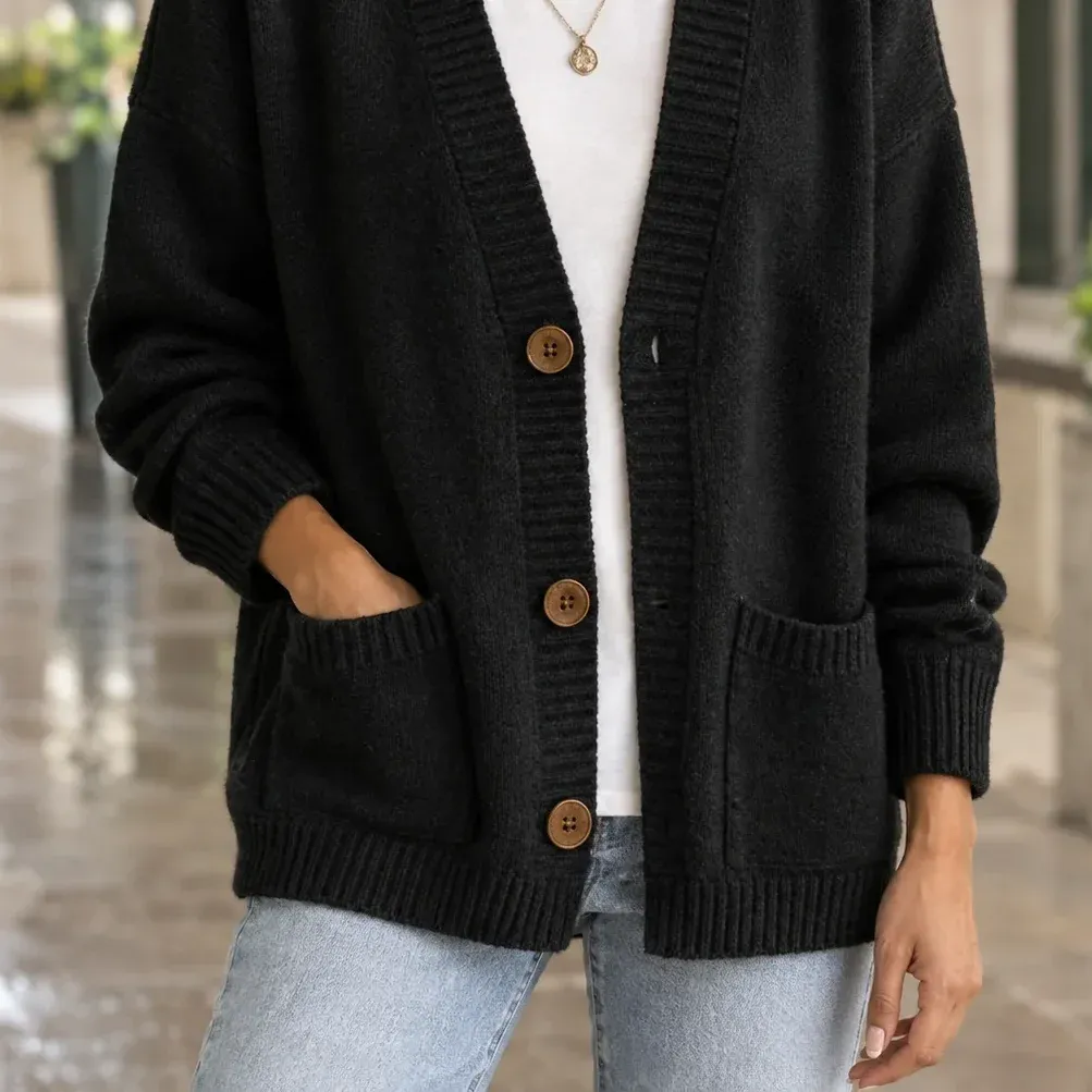 Cassidy V-Neck Cardigan — Black lower garment detail
