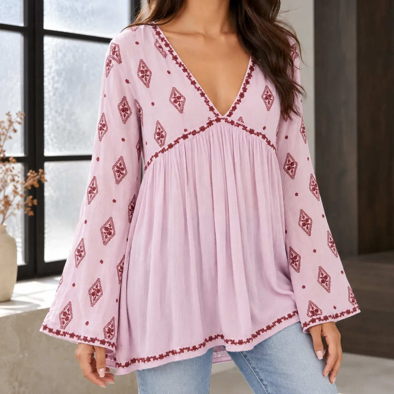 Seren Light Pink blouse, complete front view with flared sleeves and gathered lower body