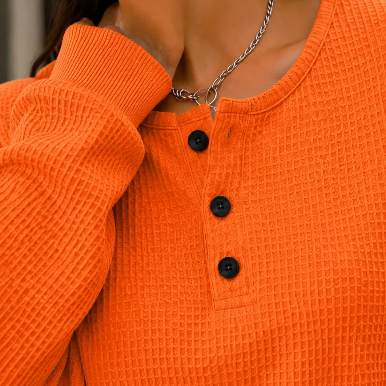 Annabel Waffle Henley — Orange construction detail