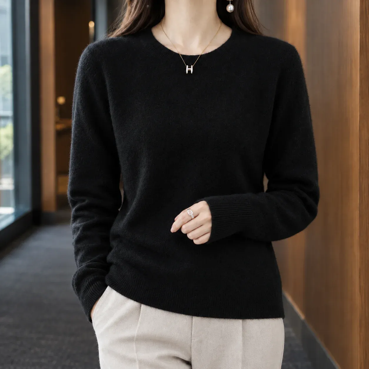 Astrid Crewneck Sweater — Black construction detail