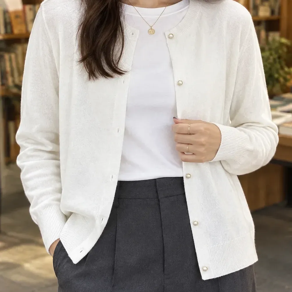 Brigitta Pearl-Button Cardigan — White construction detail