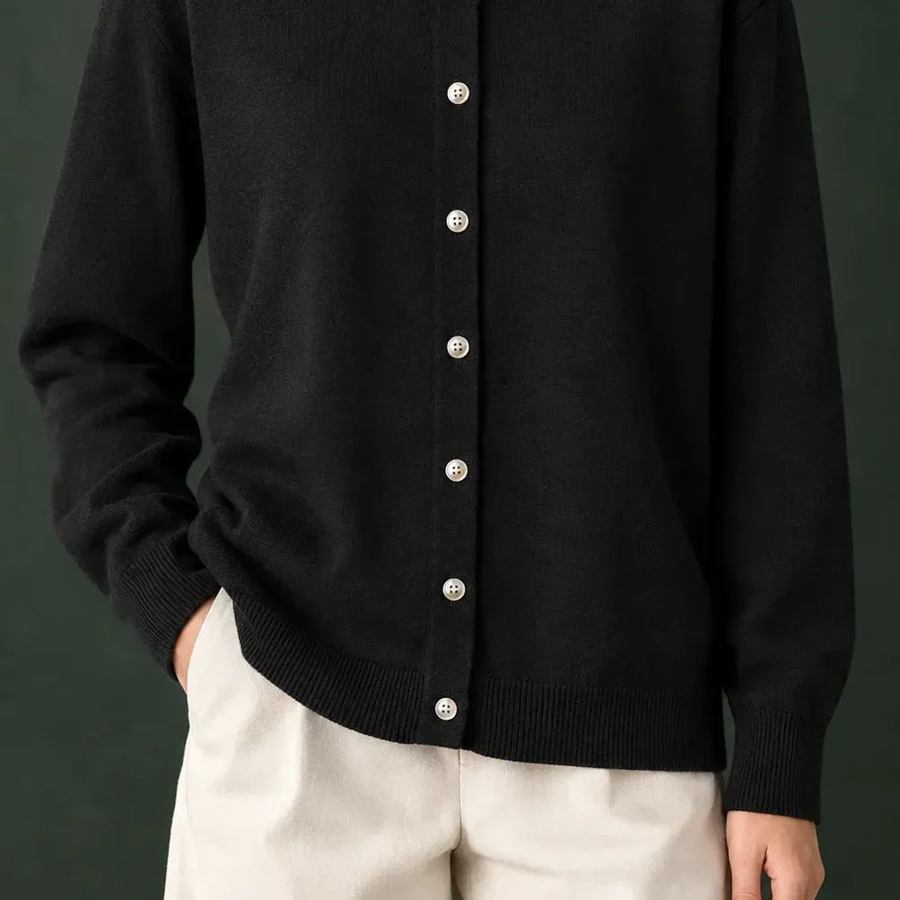 Danielle Button Cardigan — Black lower garment detail