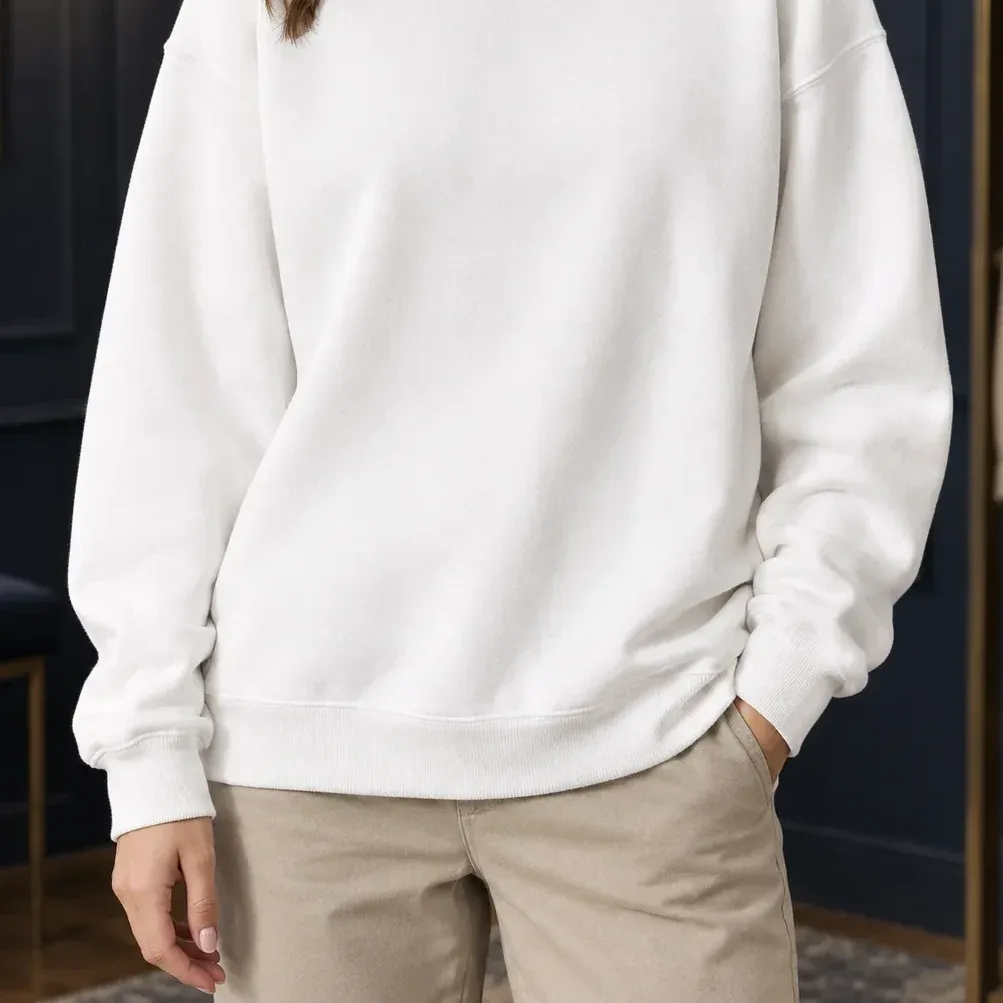 Candela Crewneck Pullover — White lower garment detail