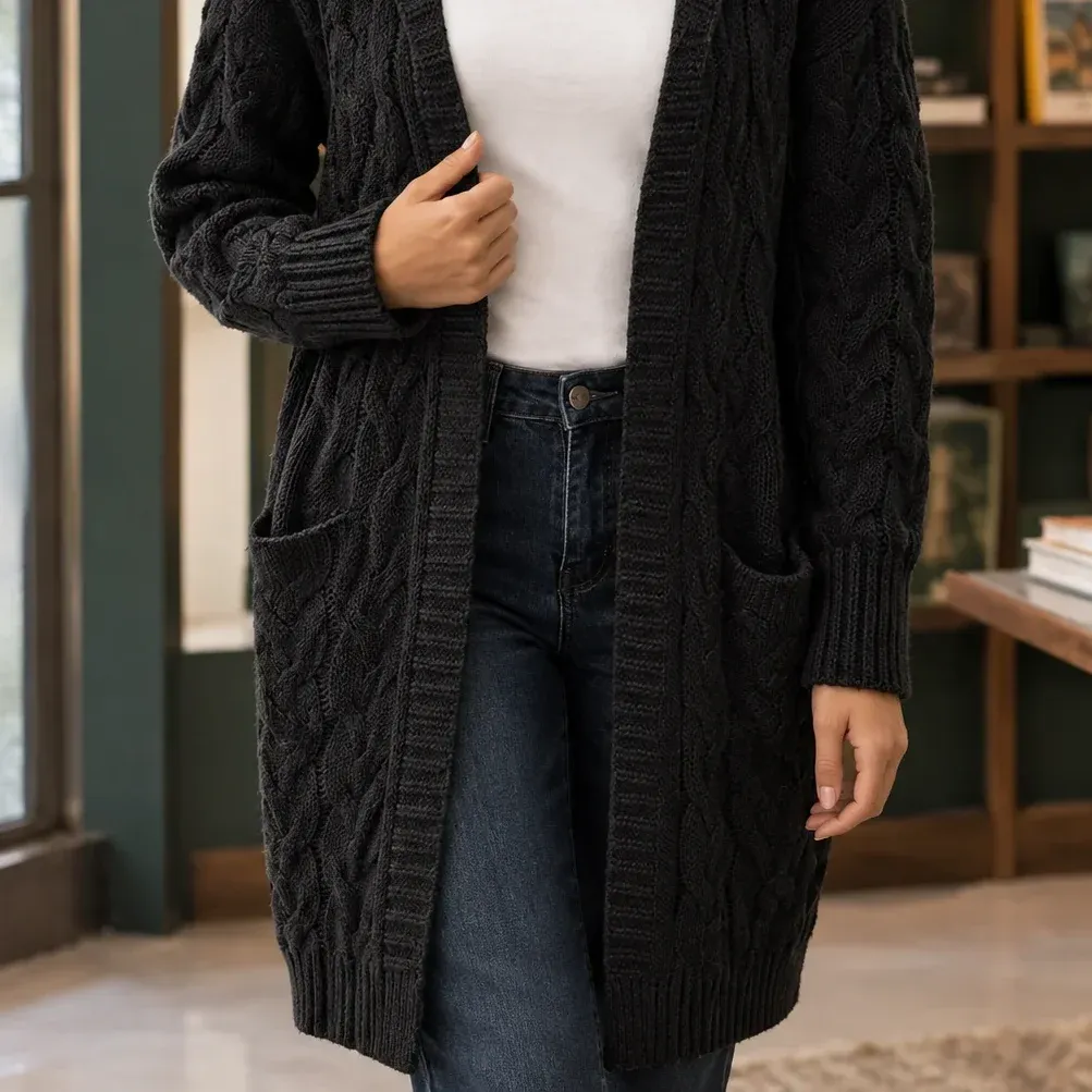 Giselle Cable Cardigan — Black lower garment detail
